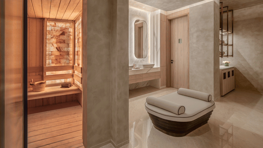 Spa area featuring a sauna room, freestanding tub and cabinetry at The Residency Signature Madurai.
