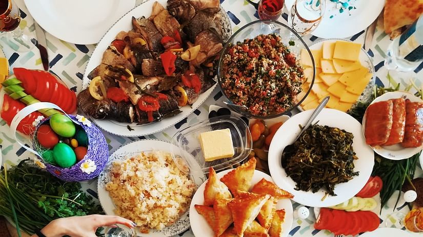 a table set up for a feast with a variety of food