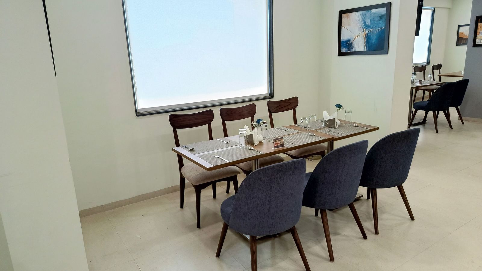 Seating arrangement inside the restaurant 3 - Starlit Suites, Shirdi