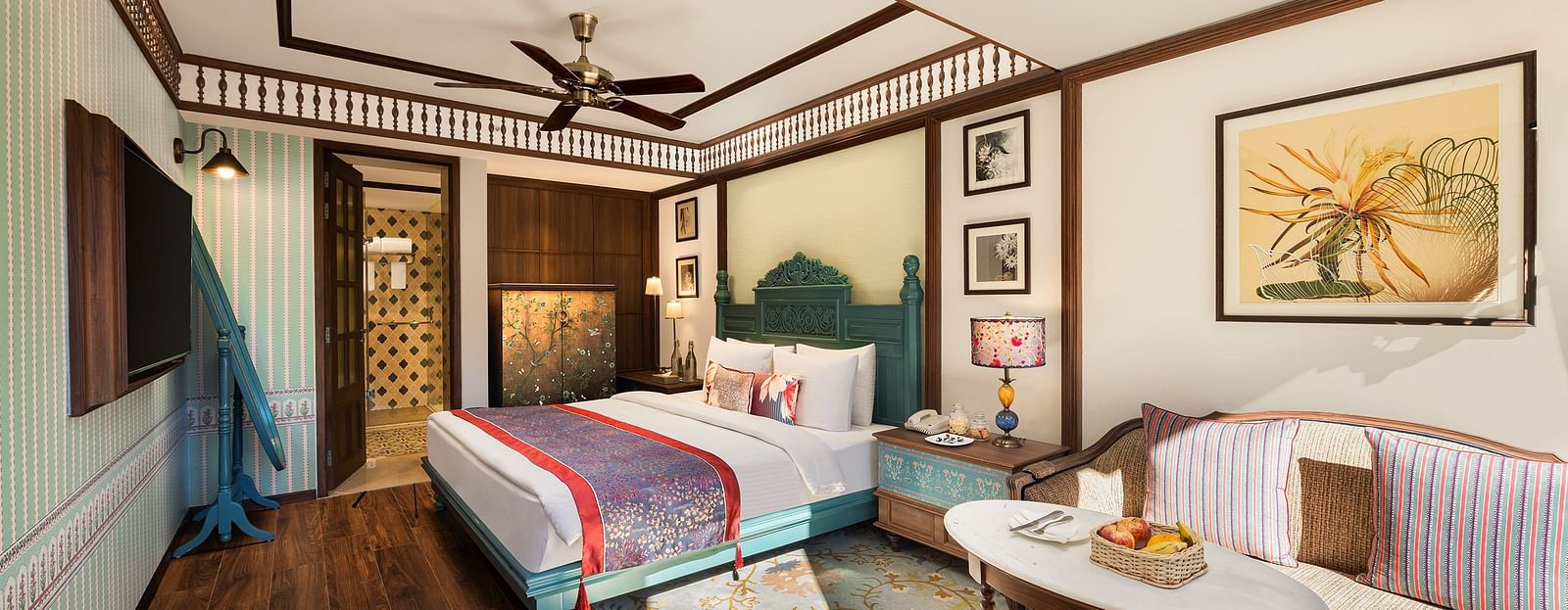 Premium Garden Room at naini retreat, nainital, A cozy and inviting hotel room with a king-size bed, The room features a small sitting area with a sofa and a side table, as well as a large window overlooking a garden.
