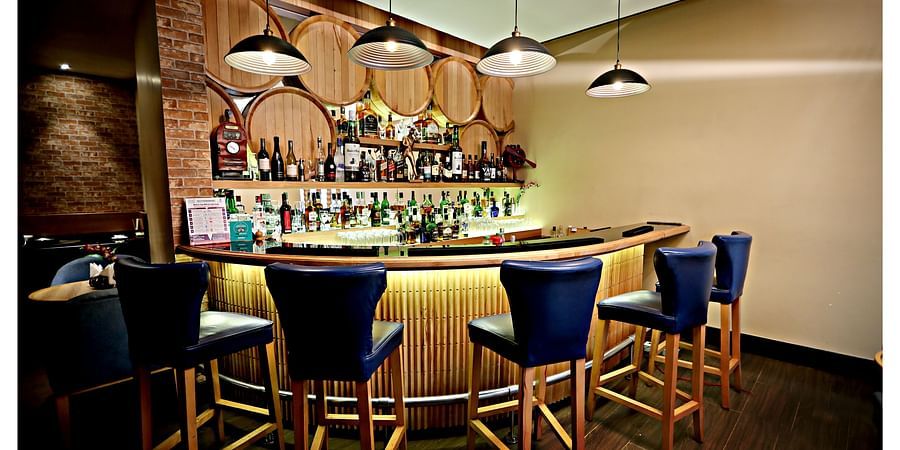 alt-text the bar counter at Wood House bar in Vizag
