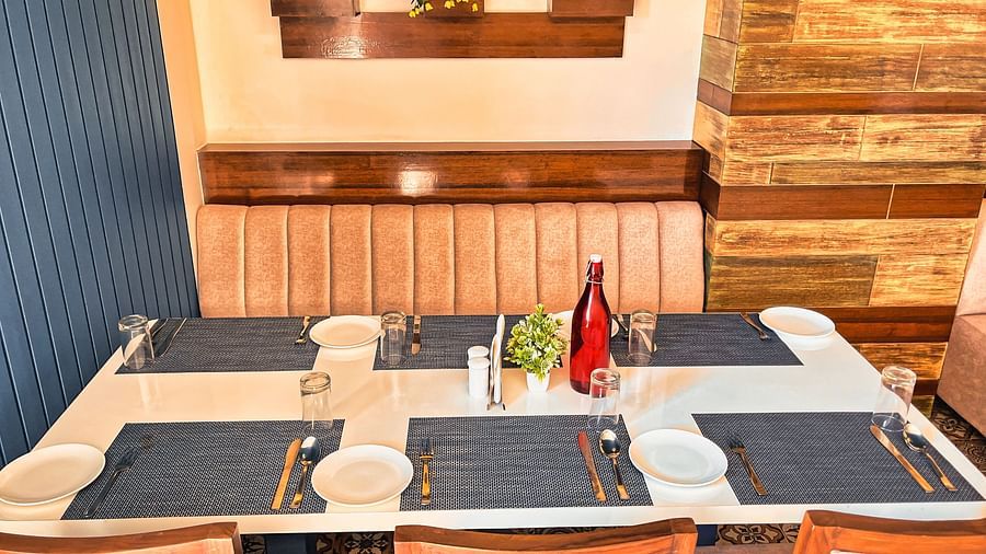 Top view of a table with cutleries arranged on it at Clarks Inn Express, Udaipur.