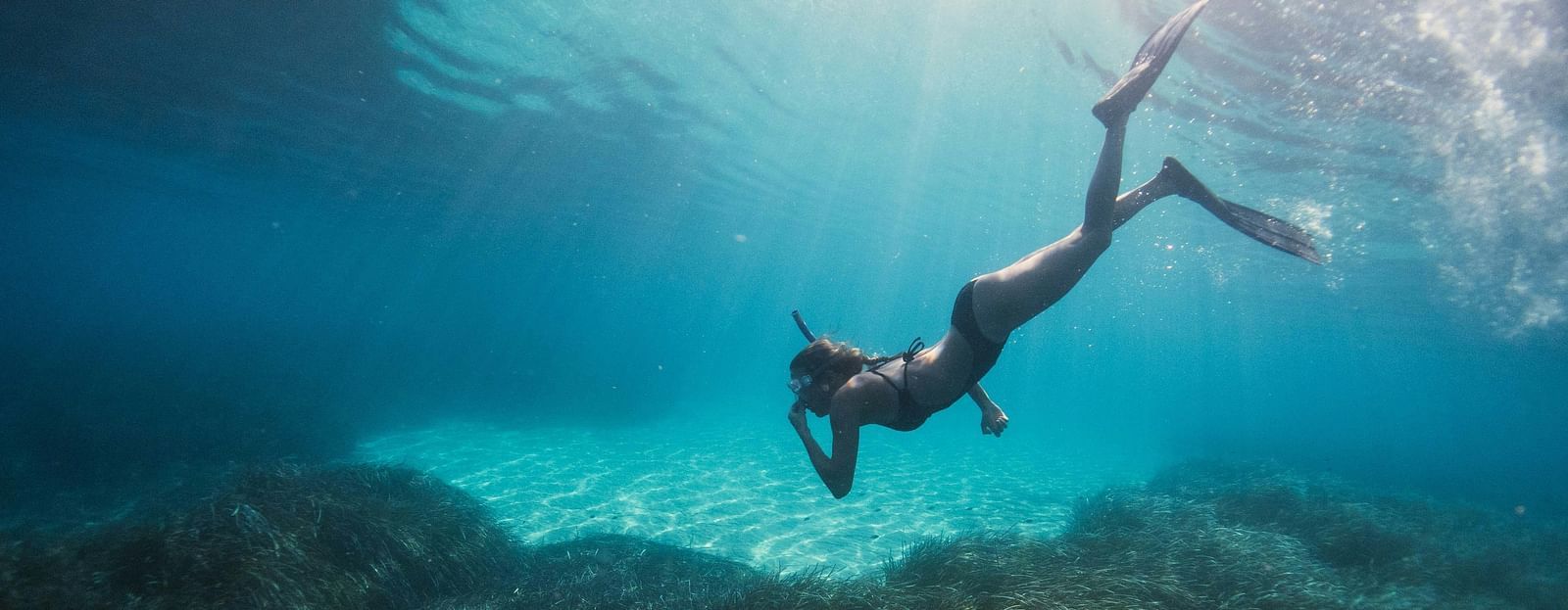 A person enjoying the activity of snorkelling - Alibu Resort Nha Trang