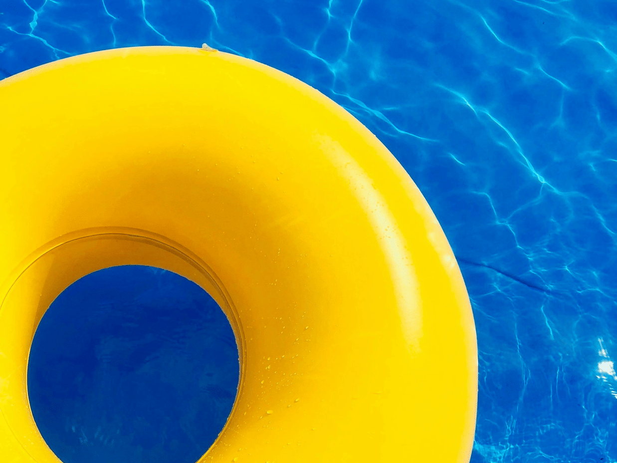 Splash Island Water Park in Saint Lucia featuring exciting inflatable water attractions on the crystal clear waters of Rodney Bay.
