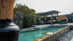 POOL VILL-1 - a pool with clear blue water captured during daytime