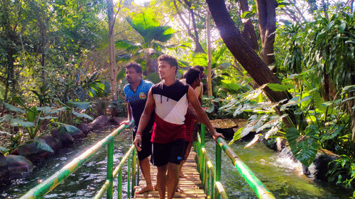 people walking on the bridge during Slot Walk - Black Thunder, Coimbatore