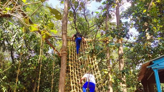 two people trying their hand at Cargo Net - Black Thunder, Coimbatore