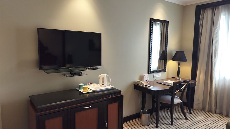  Luxurious hotel EXECUTIVE  ROOM at St Marks Hotel with bright lighting and sophisticated seating area