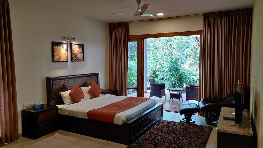 The Birchwood Retreat - bedroom with the view of the garden. 