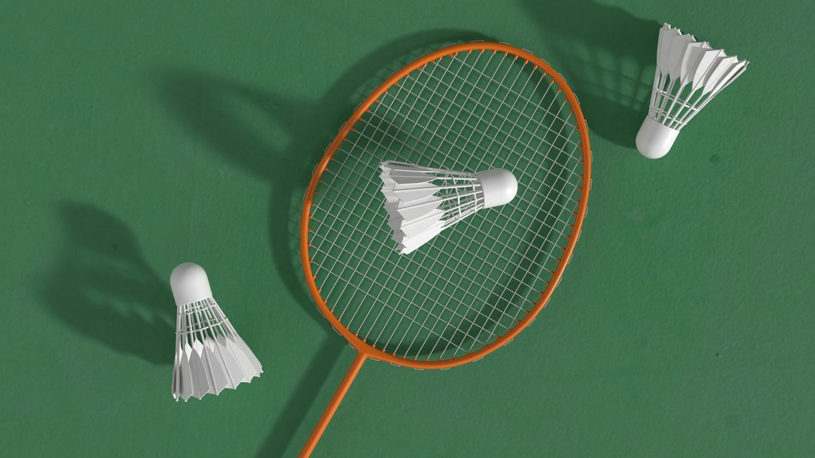 A green background with a racket and shuttlecocks arranged on the surface.