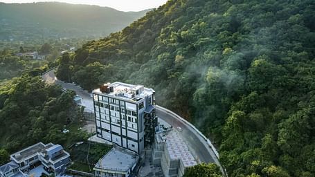 An aerial shot of a misty morning at NAMAMI BY ZENQ BANKHANDI