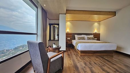 view of a king size bed of Attic Family Suite at Sumitel Pelling, Geyzing