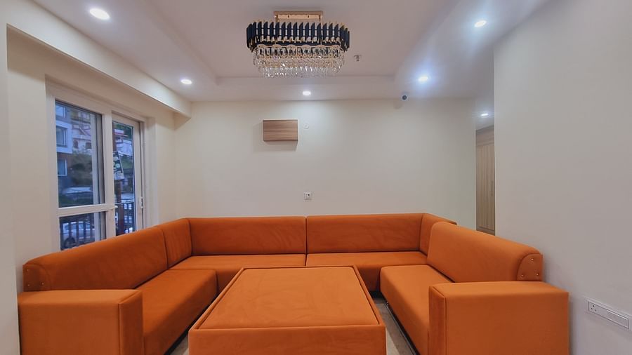 Lobby area with sofa and lights on the ceiling at Pines and Peaks, Dalhousie 