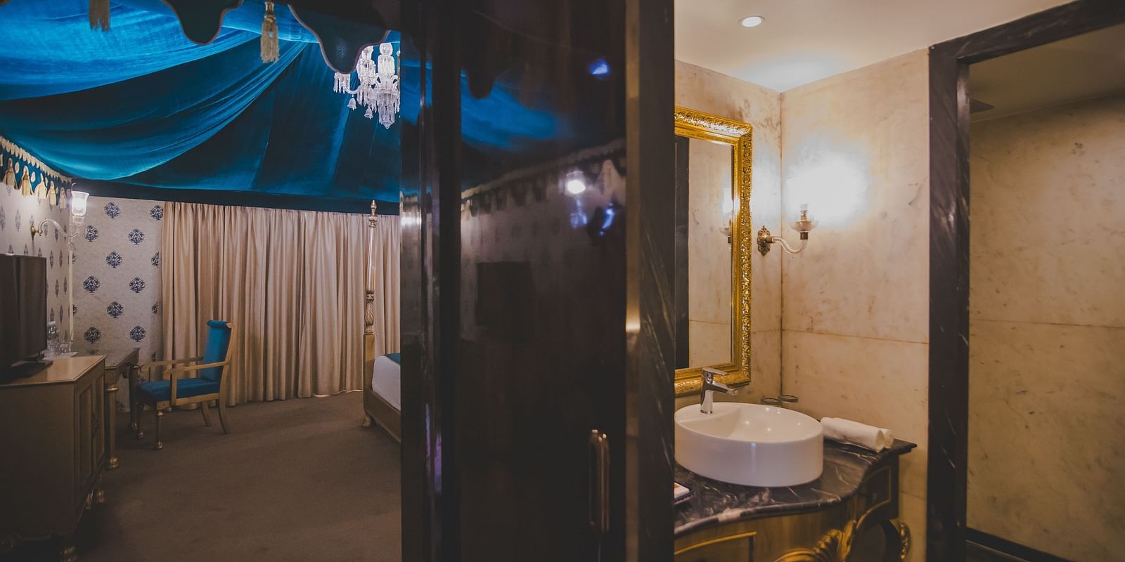 An overview of the bathroom inside Royal Luxury Tent with Balcony with the sink area seen - Rajasthali Resort & Spa, Jaipur.