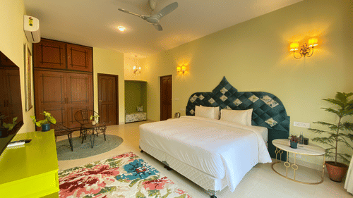 An overview of a bedroom inside one of the villas - Karma Lakelands.