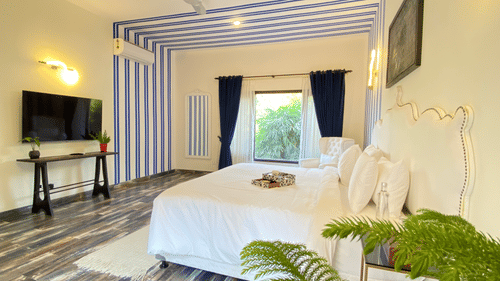 An overview of a bedroom inside one of the villas - Karma Lakelands.