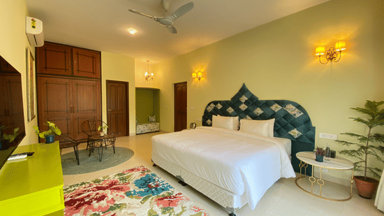 An overview of a bedroom inside one of the villas - Karma Lakelands.