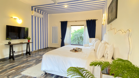 An overview of a bedroom inside one of the villas - Karma Lakelands.