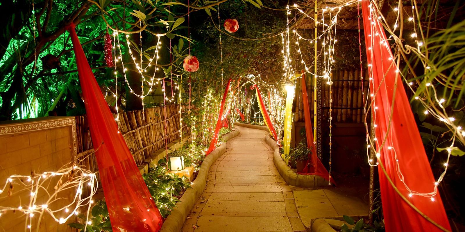 wedding decorations at night at the Hoysala Village Resort, Hassan