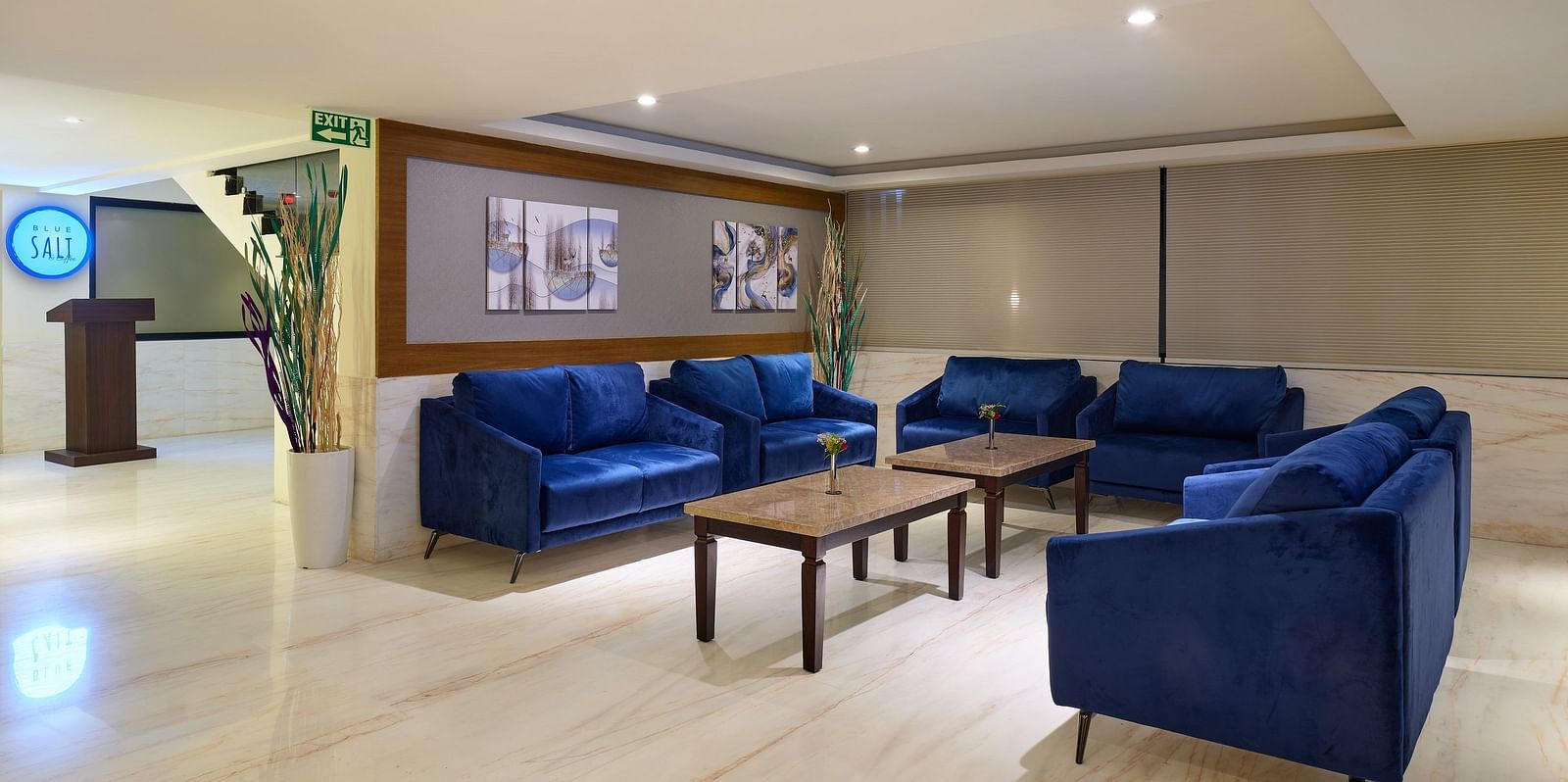 Lobby area of Essentia Premier Hotel, Chennai with sofa seating