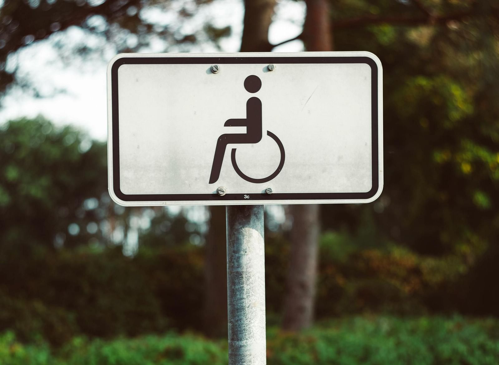 Accessible restroom sign, indicating facilities for guests with disabilities.