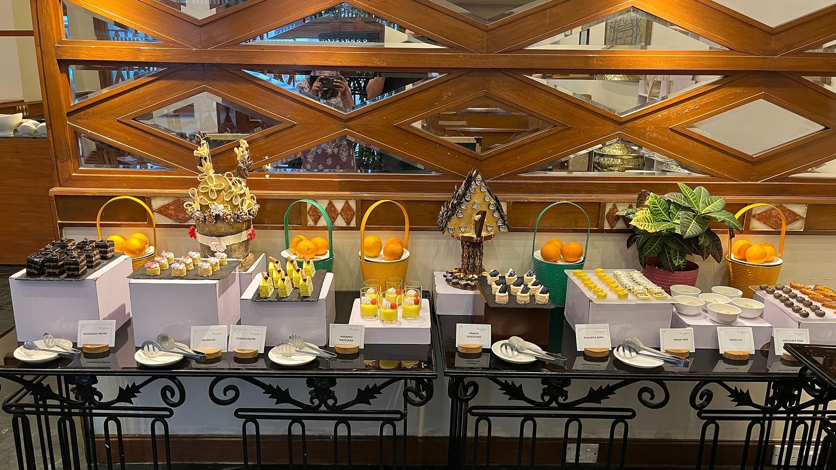 Wide angle view of the Jacaranda Sunday Buffet at The Ummed Ahmedabad, showcasing an array of dishes and vibrant decor.