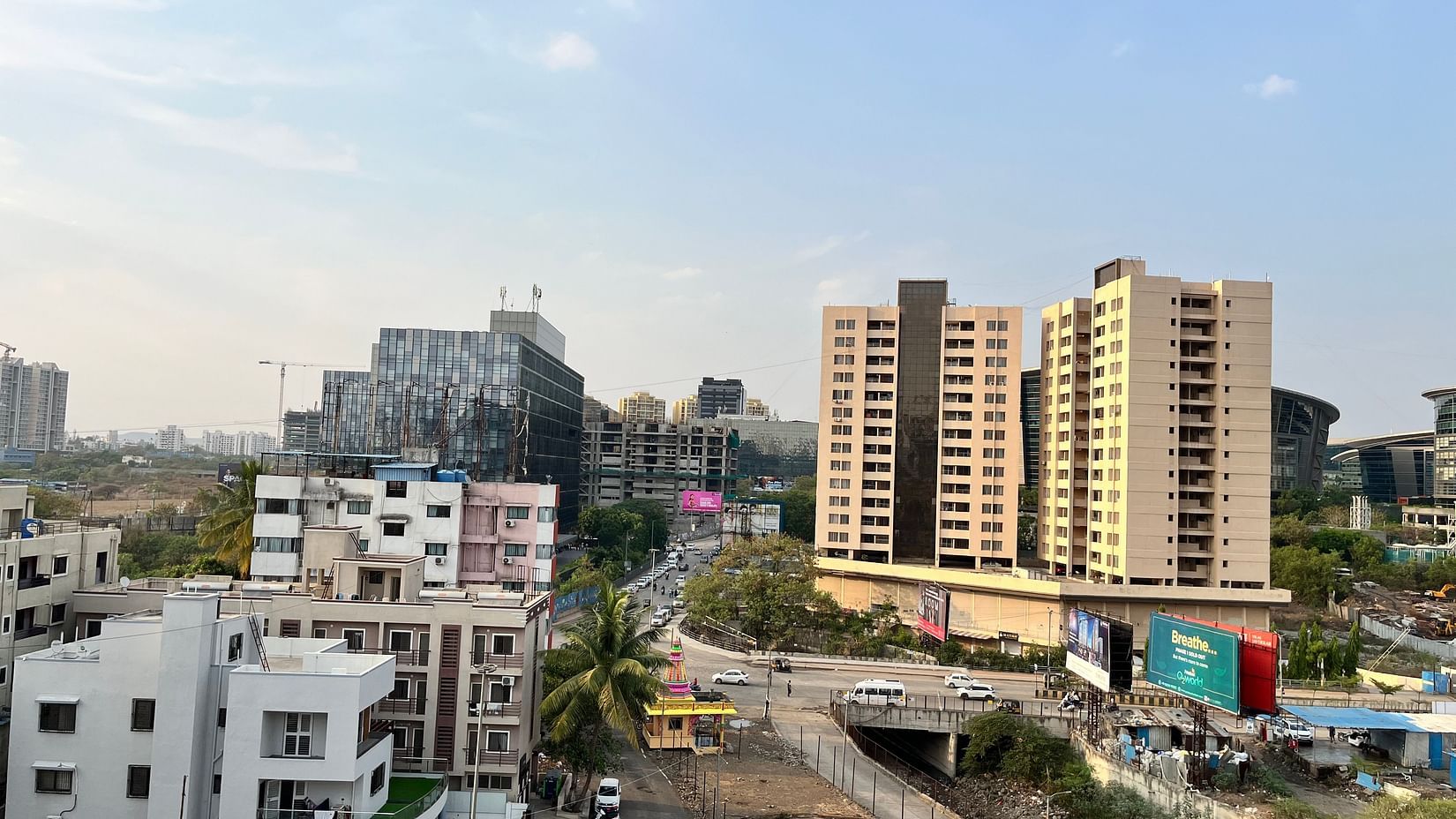 A far away image of the hotel building captured from another building at VITS Select Kharadi, Pune.