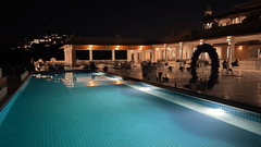 Fateh Vilas - view of the swimming pool at nighttime