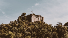 Aguada Fort perched up on a hill covered with greenery