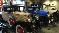 Vintage Cars in a Well Lighted Room