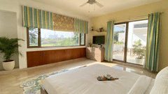 An overview of a bedroom inside one of the villas - Karma Lakelands.