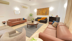 An overview of the living room inside a Villa - Karma Lakelands.