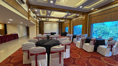 Banquet hall with cluster seating arrangement at VITS Kamats Resort, Silvassa 