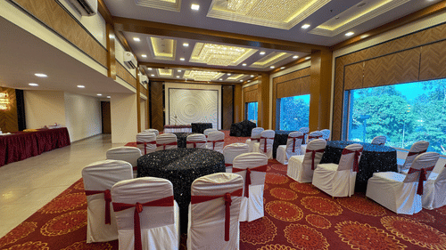Banquet hall with cluster seating arrangement at VITS Kamats Resort, Silvassa 