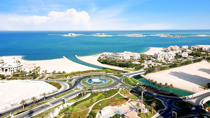 Aerial view of Doha's coastline with the ocean in the background - La Maison Hotel, Doha