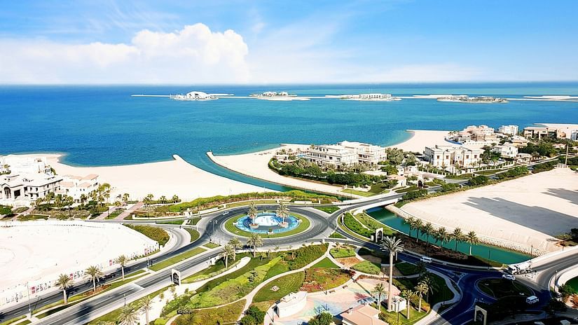 A bird's eye view of The Pearl-Qatar area with the ocean in the background