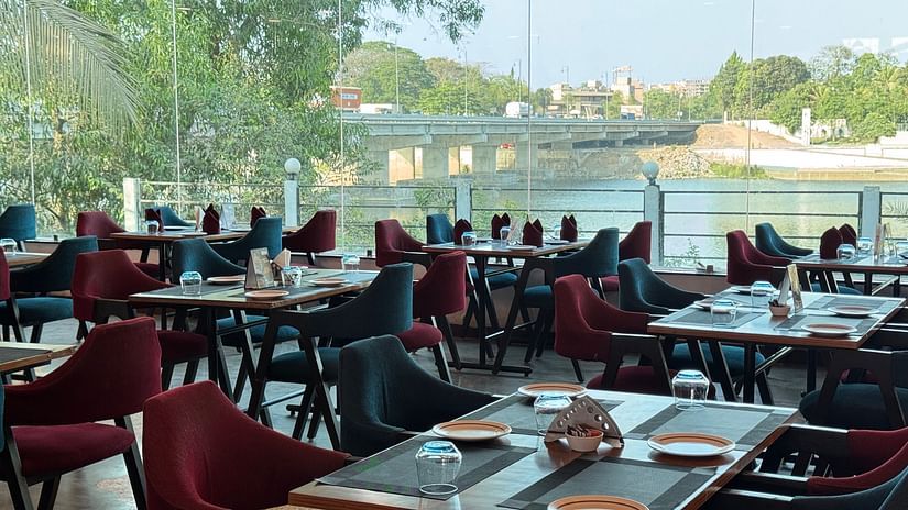 Restaurant seating area at VITS Kamats Resort, Silvassa