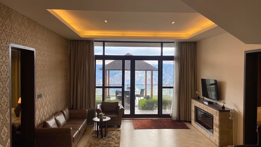 well lit sitting area with TV  - Aranya Himalayan Retreat, Mashobra