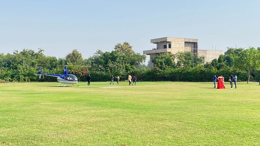 An overview of the manicured garden with people on it - Karma Lakelands.