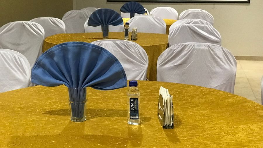 Close shot of tables in the banquet hall | Kyriad Hotel, Solapur