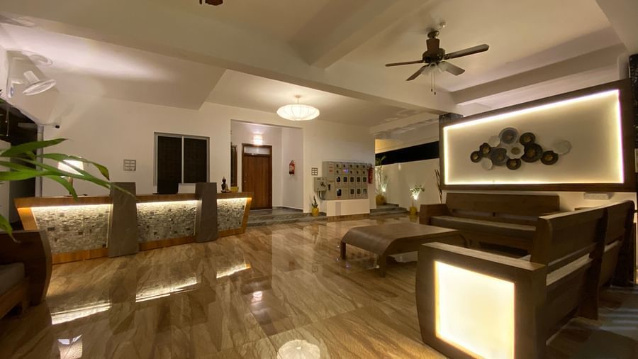 Side view of Seating area near the reception of Le Poshe Luxury