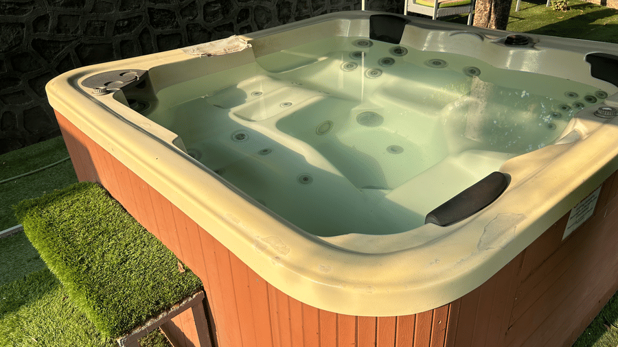 Outdoor jacuzzi with warm bubbling water, set in a peaceful garden space – Maxxvalue Klub Klass Villa, Lonavala.