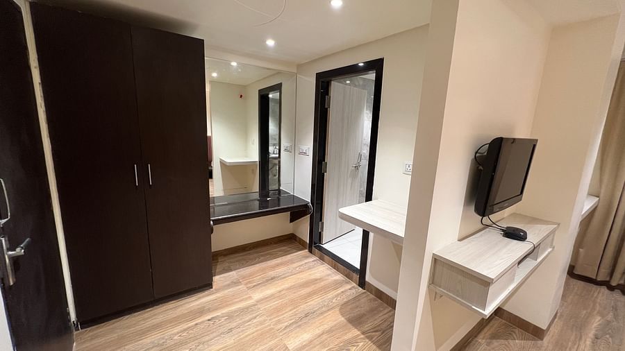 Premium rooms having spacious wardrobe with full length mirror and a TV - Hotel Morya, Bhopal
