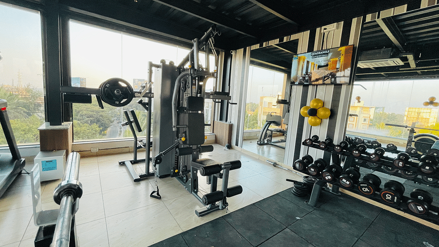 full view of interior of a gym with equipments - Quality Inn Rockwell Grand