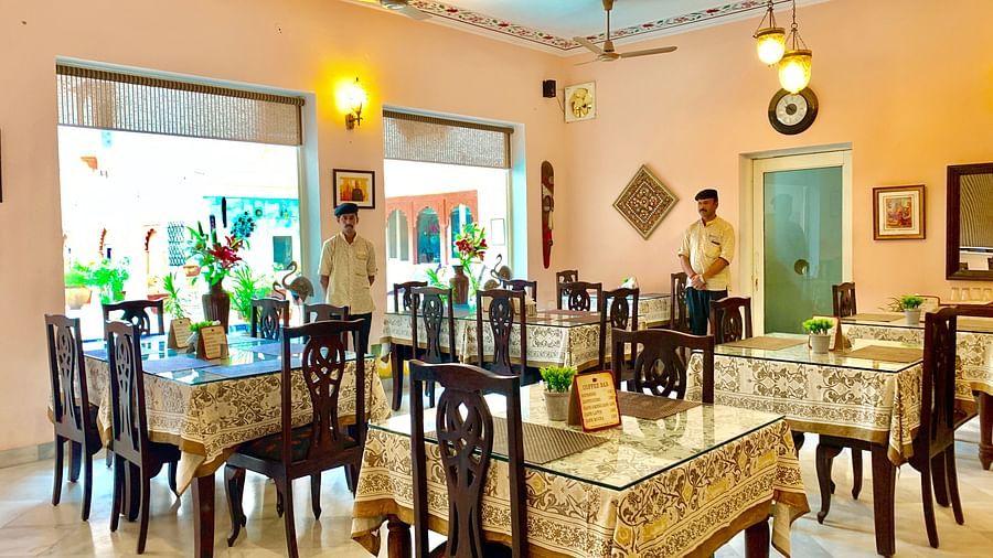 Seating arrangement of indoor Dining Area at Suryaa Villa Jaipur