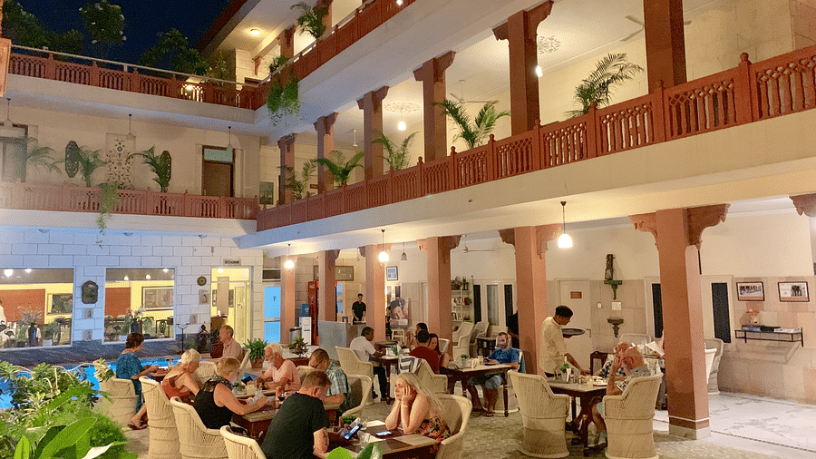 Seating arrangement at Poolside Courtyard Dining at Suryaa Villa Jaipur