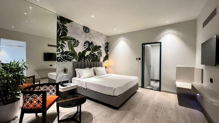 Picture featuring interior of room with a cozy bed - The Hans Hotel Hubli