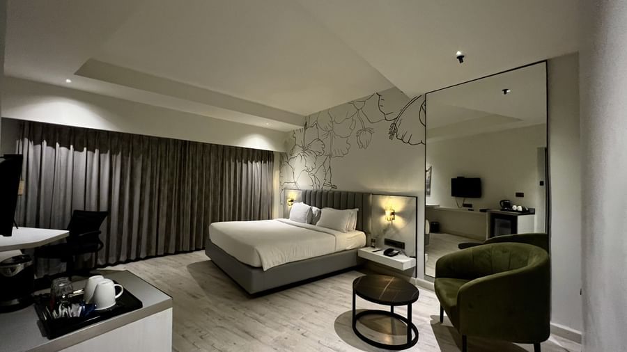 Picture featuring interior of room with a cozy bed - The Hans Hotel Hubli
