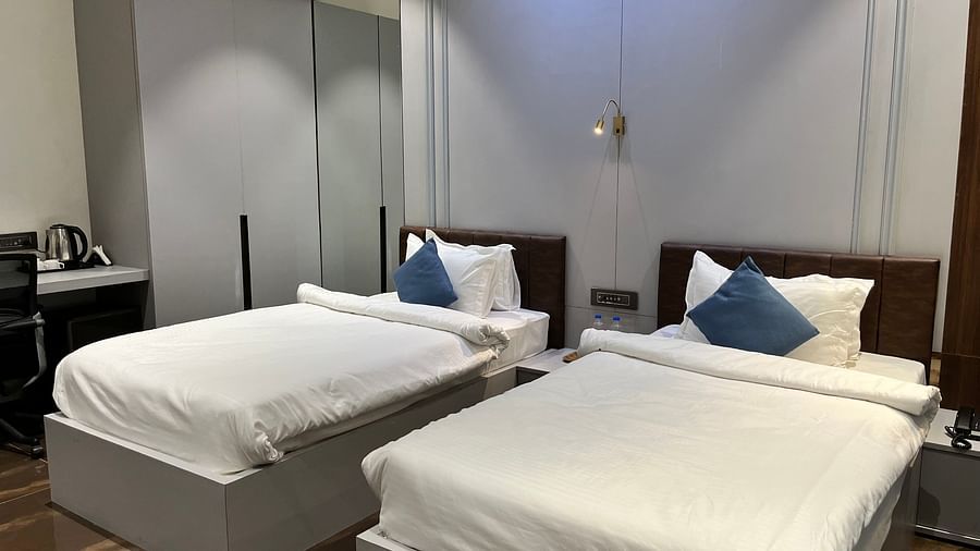 Another view of the twin beds inside standard room - VITS Jamnagar, Mithoi