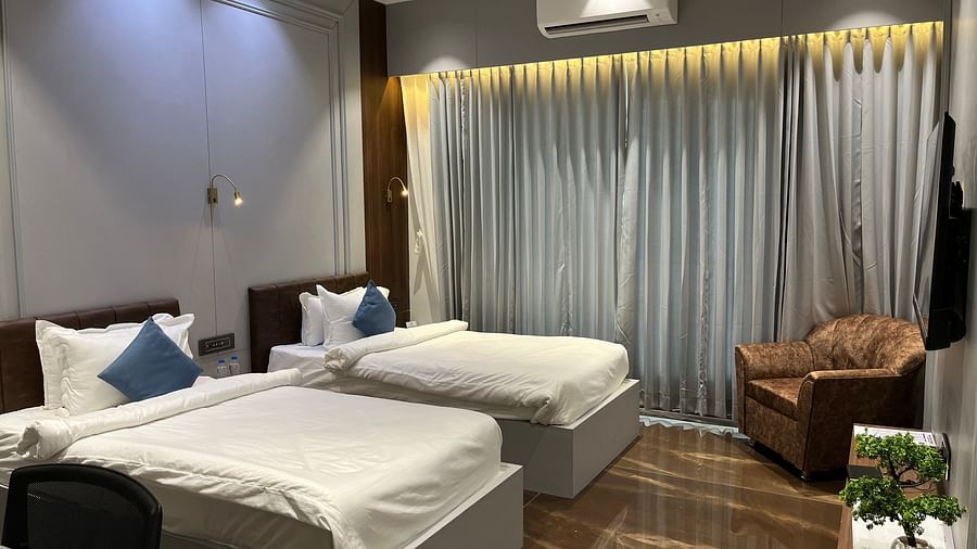 Twin beds inside standard room - VITS Jamnagar, Mithoi